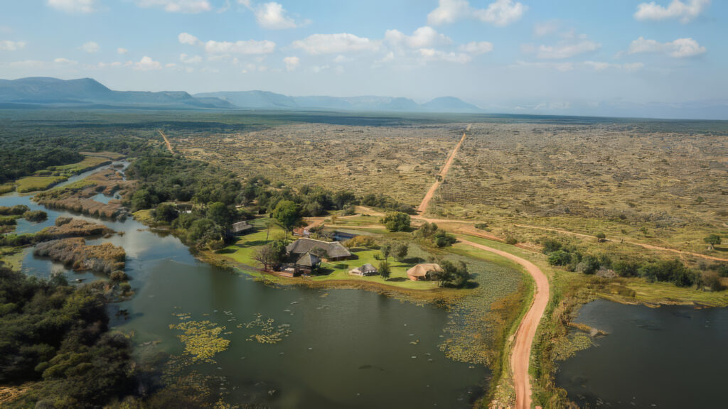 Aerial drone view of Aloe Africa hunting lodge surrounded by rivers and Limpopo bushveld, South Africa